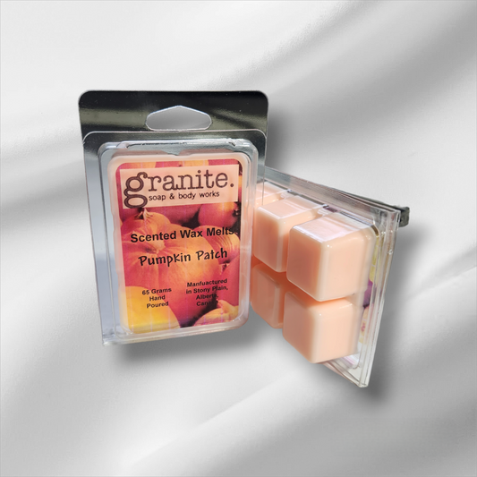 Packaging of Granite Soap and Body Works scented wax melts in Pumpkin Patch fragrance, with visible wax melts in a clear plastic container.